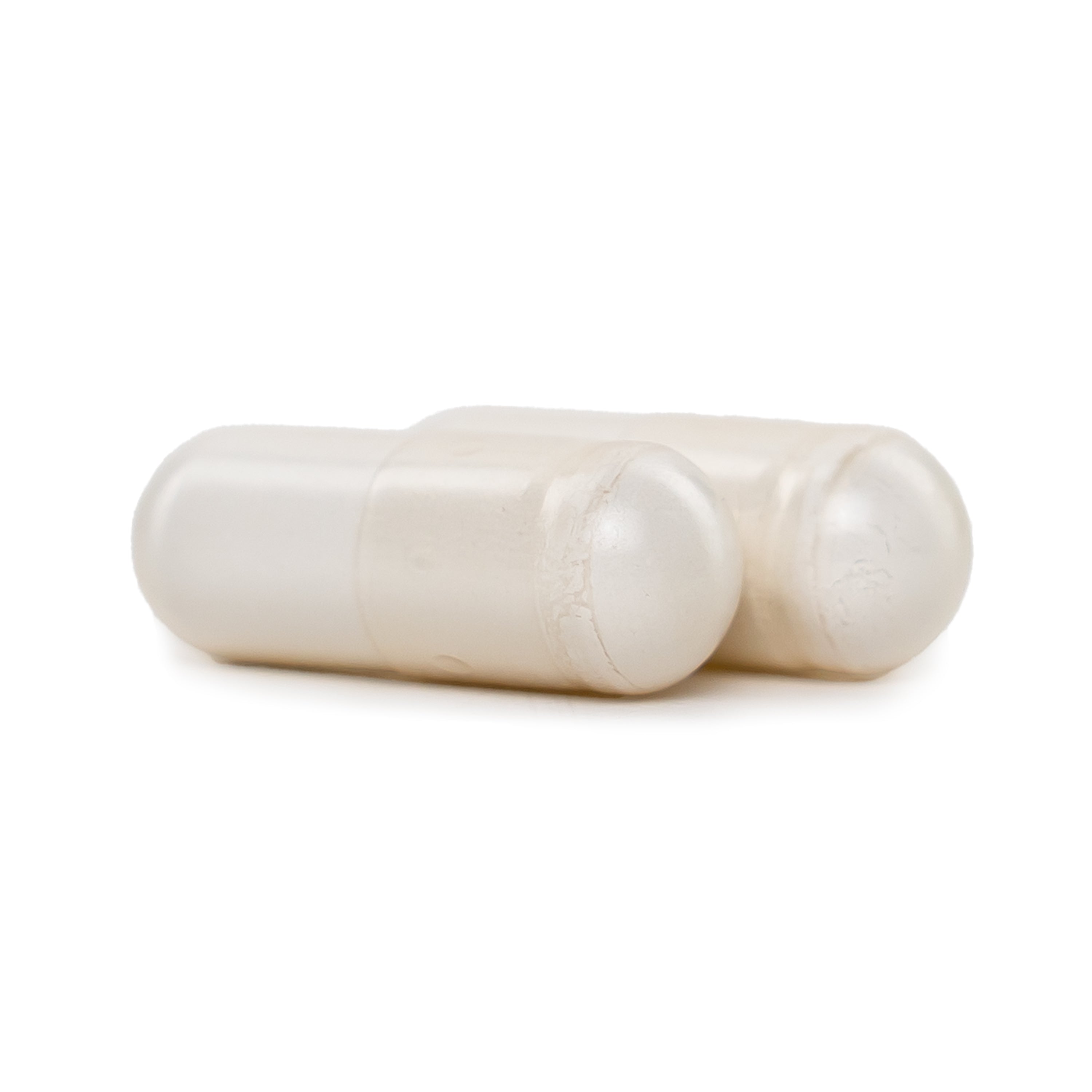 Two NatureWise Algae Calcium Plus capsules on a white background