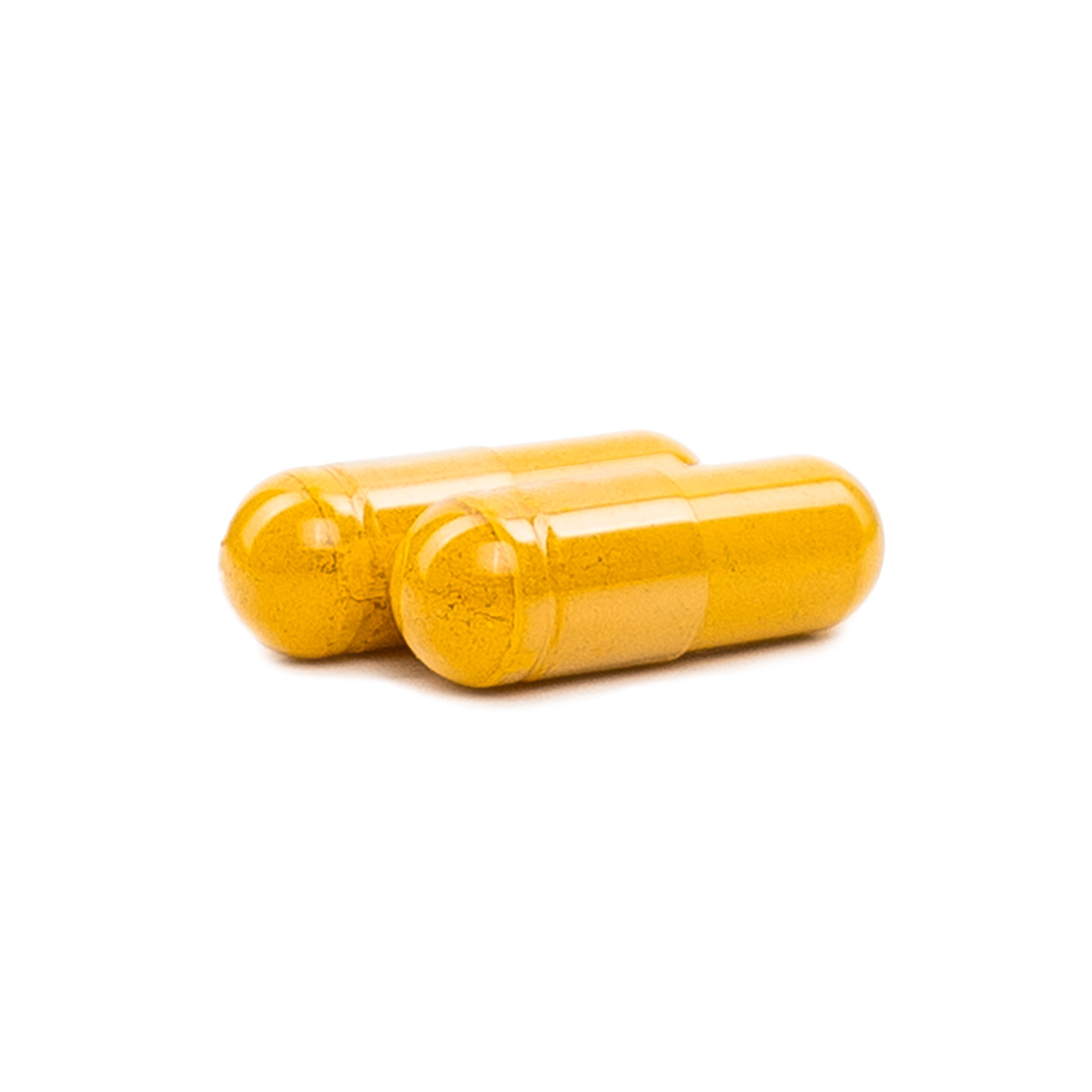 Two yellow capsules on a white background