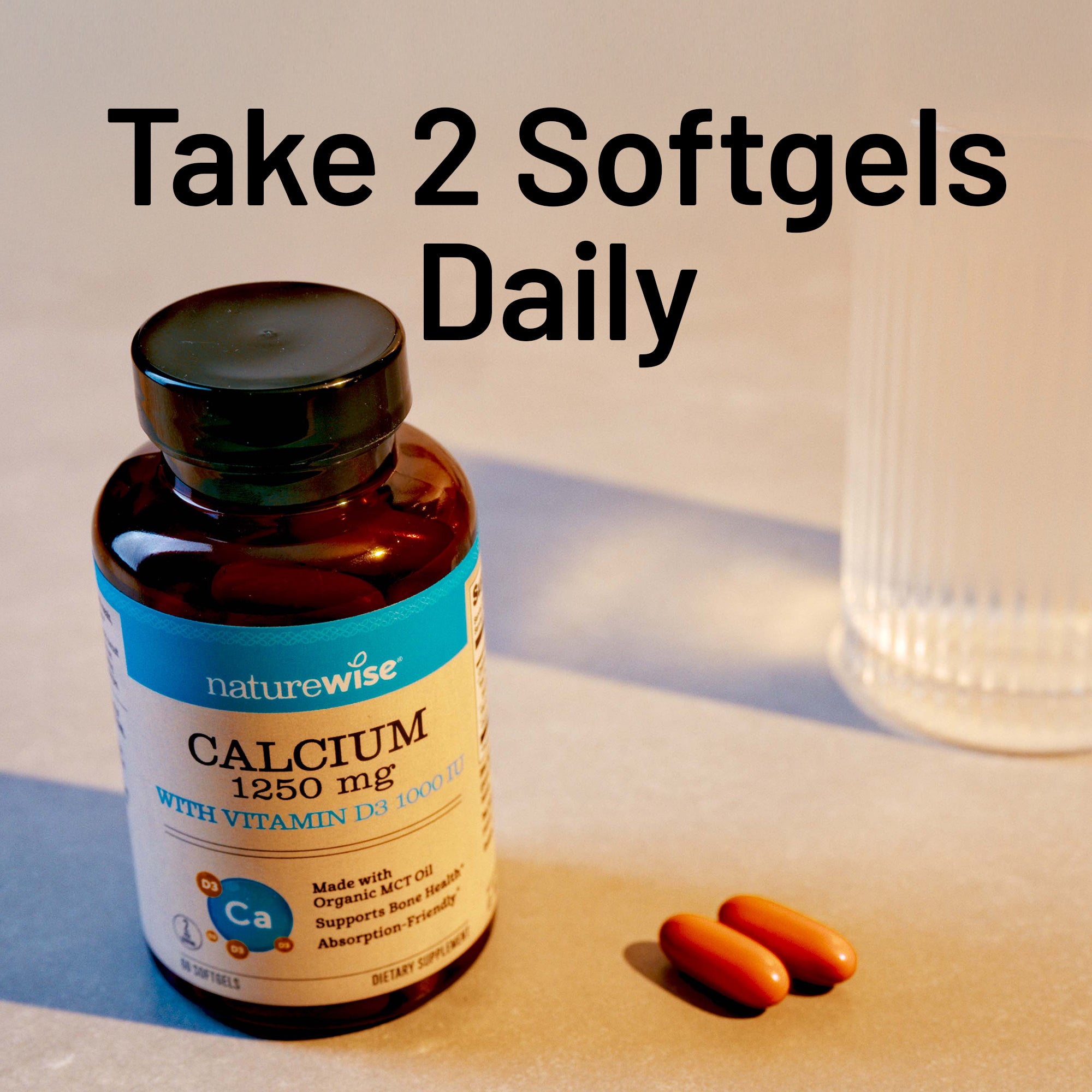 Naturewise calcium supplement bottle with softgels on a neutral background