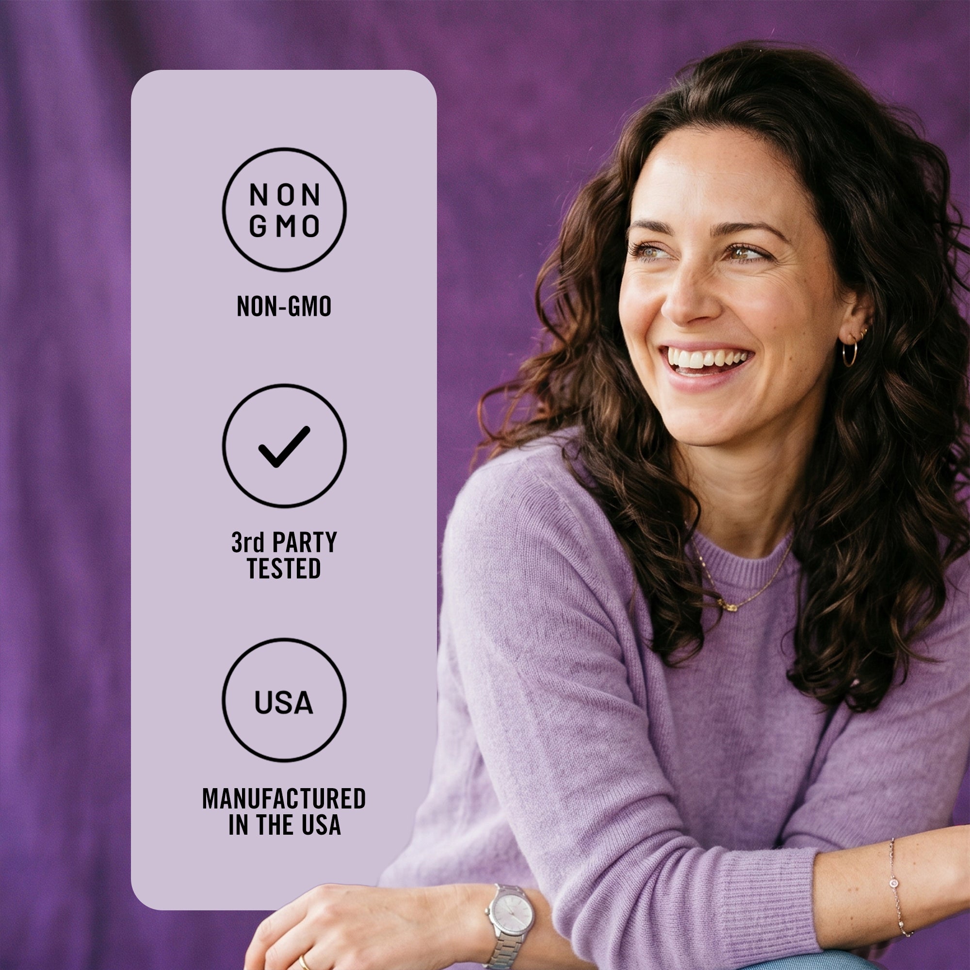 Woman in a purple sweater with a label on the left side indicating non-GMO, third-party tested, and USA manufacturing.