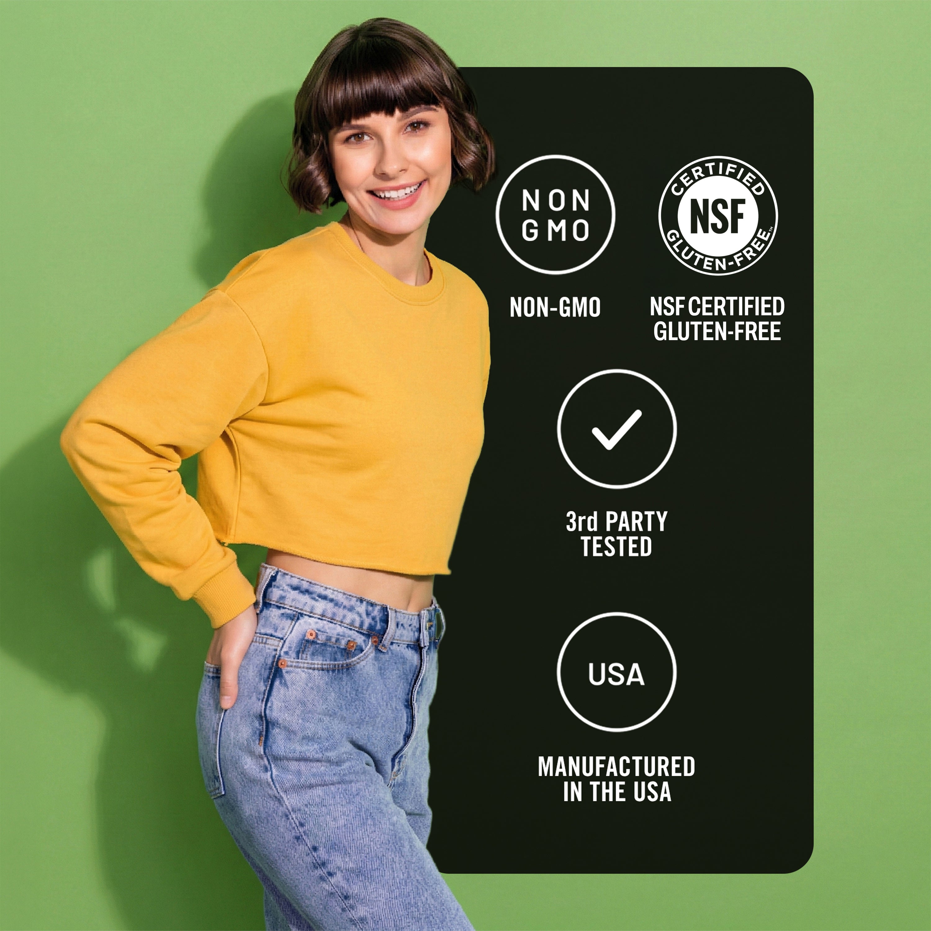 Person wearing a yellow sweater and blue jeans with certification badges on a green background