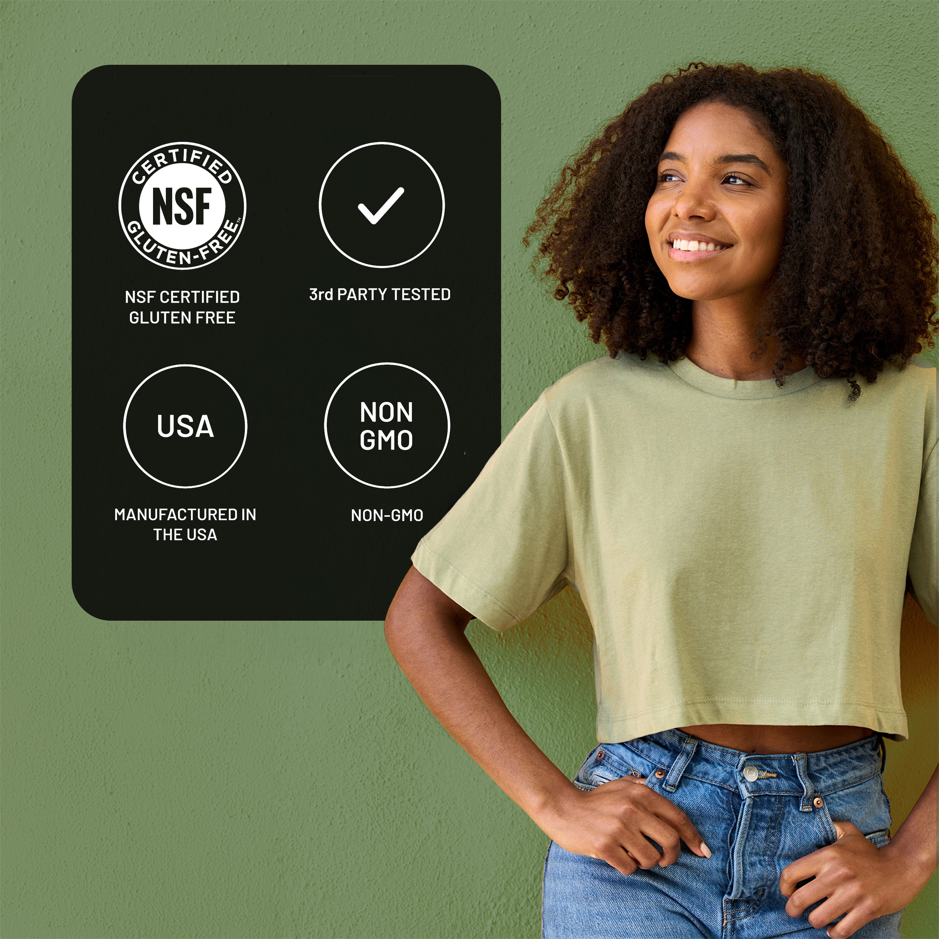 Woman wearing a green t-shirt with certification badges on a green background