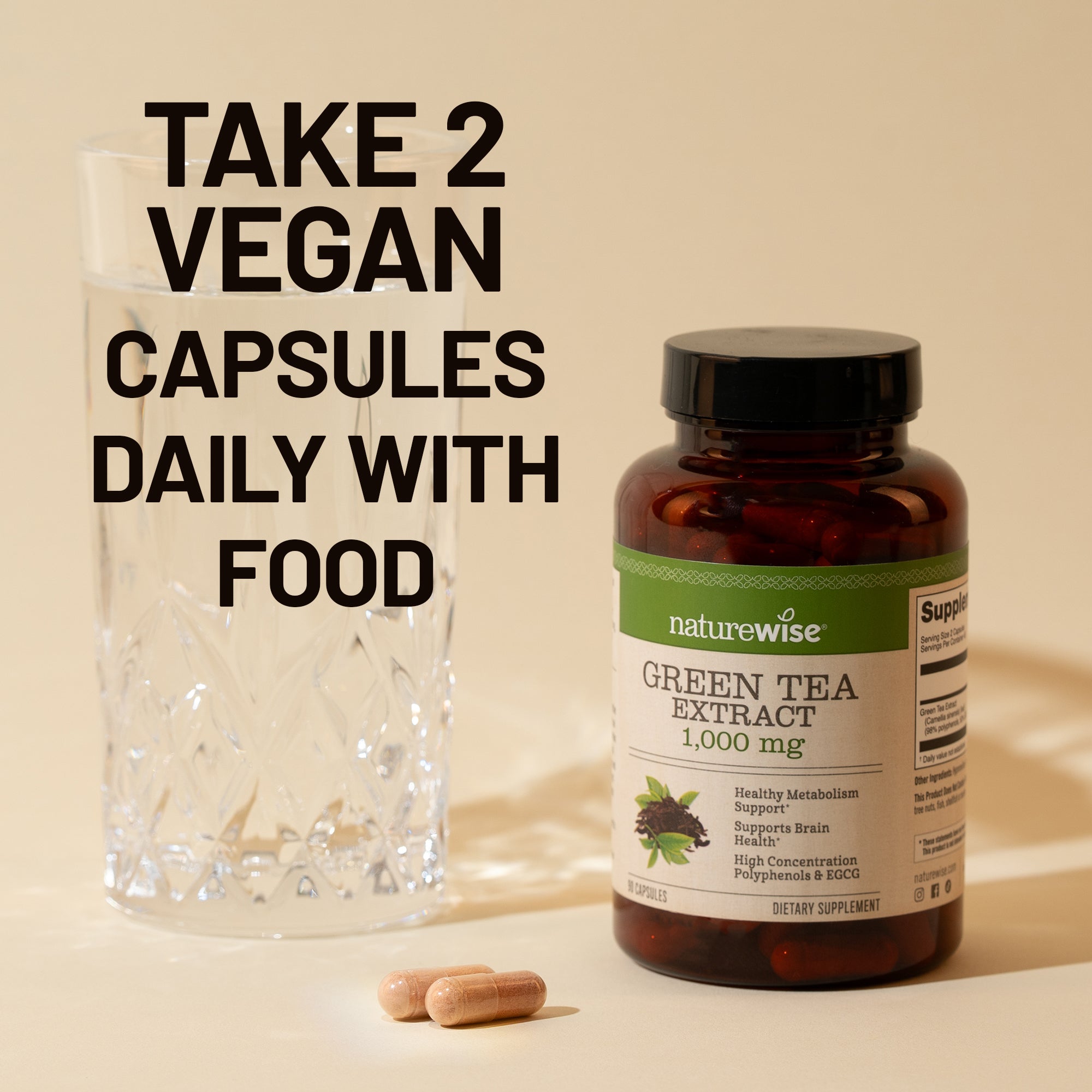 Naturewise Green Tea Extract supplement bottle with capsules and a glass on a beige background