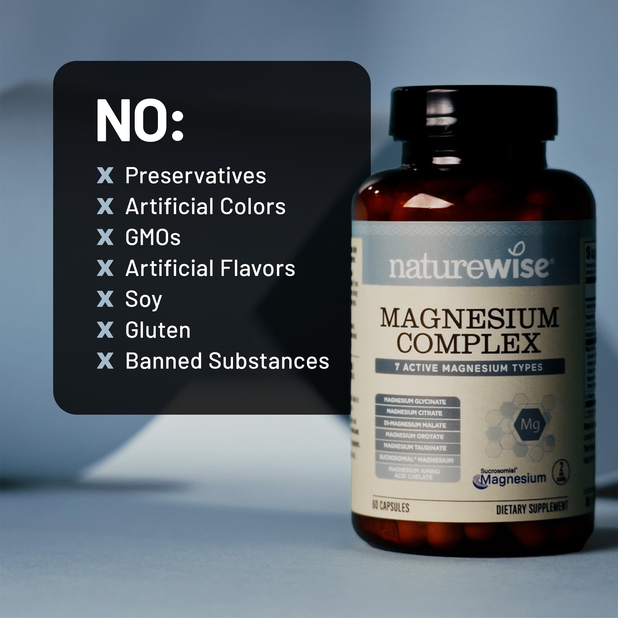 NatureWise Magnesium Complex with 7 active magnesium types supplement bottle with a list of no ingredients on a gray background
