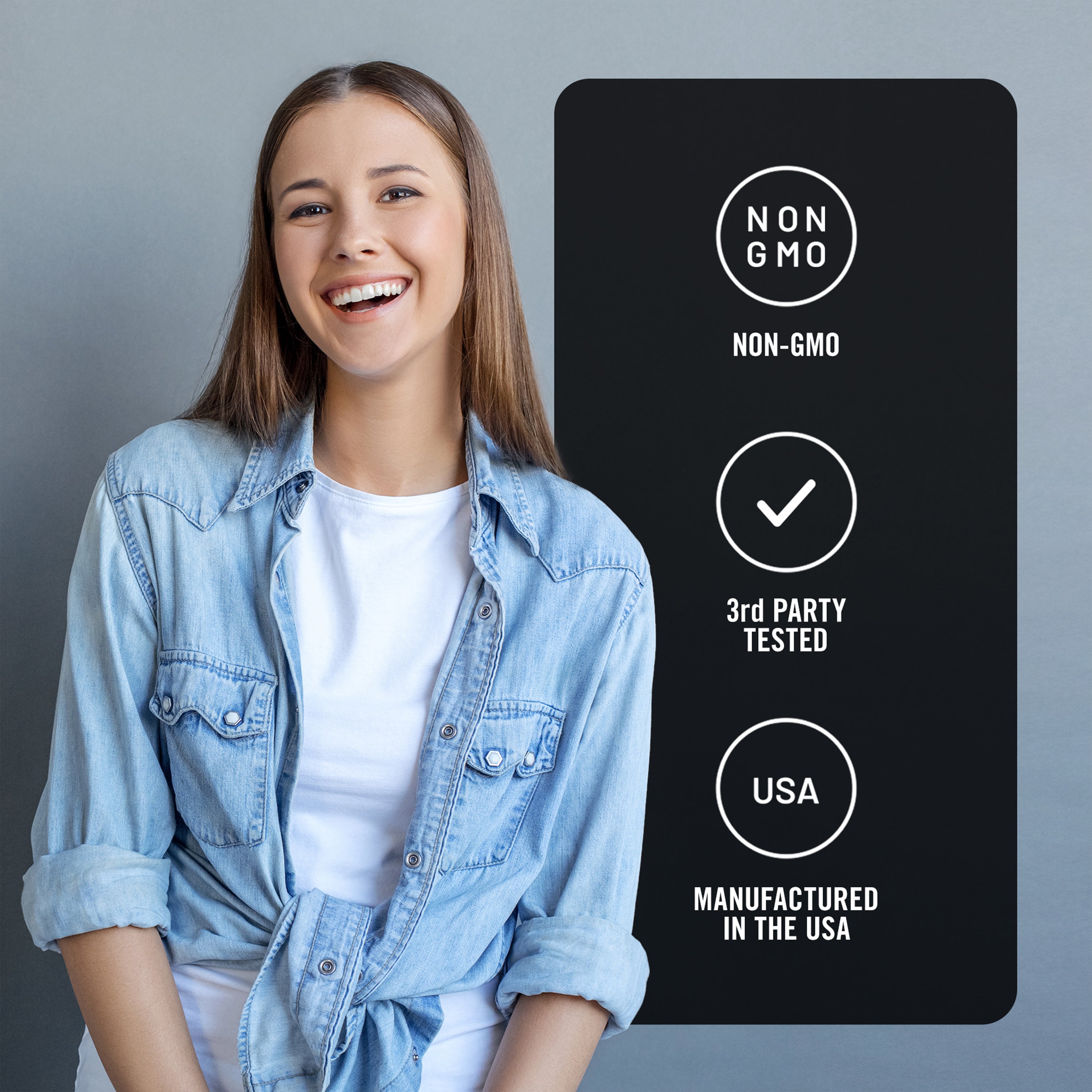 Woman wearing a denim jacket with a certification label on a gray background