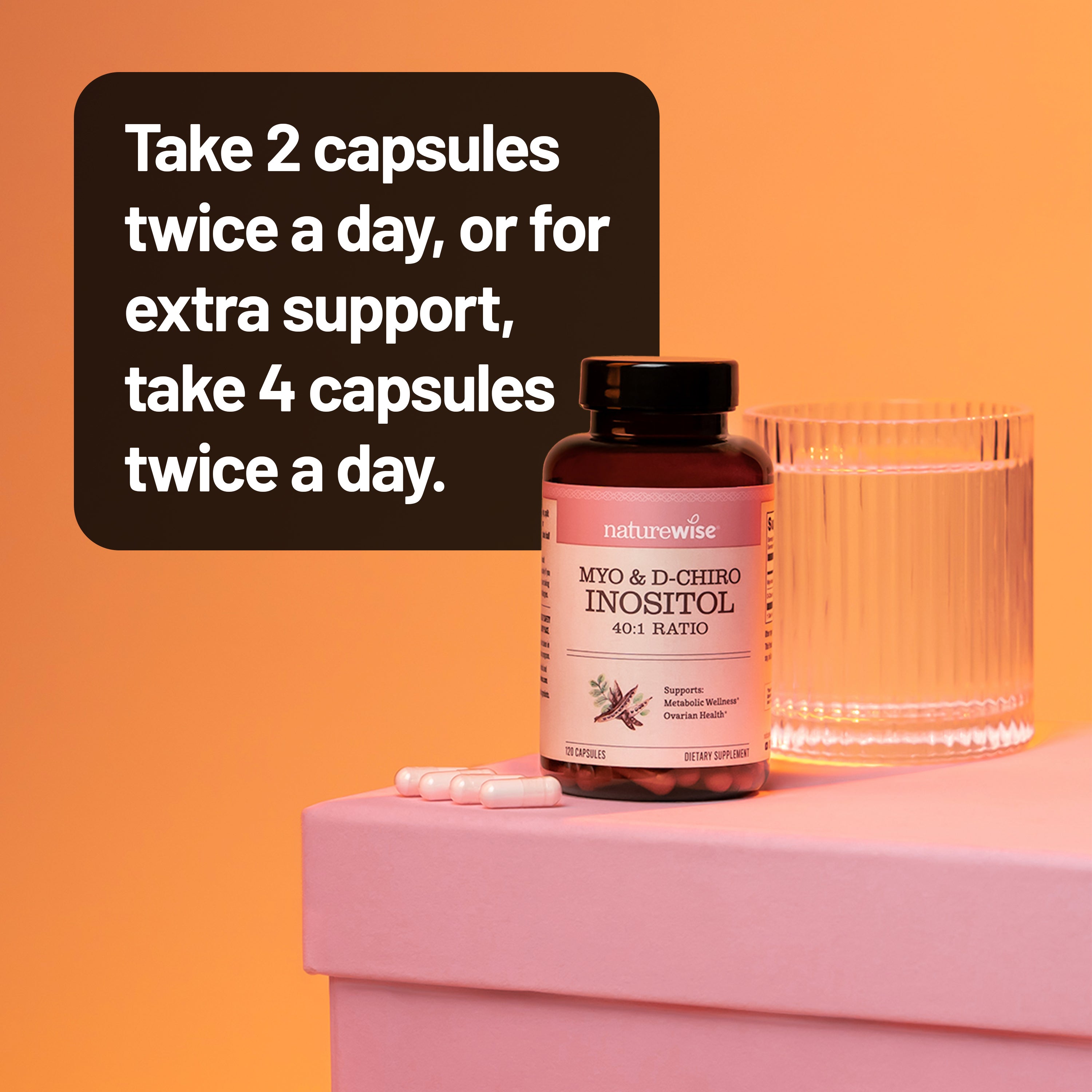 Naturewise myo inositol supplement bottle with capsules and a glass on an orange background