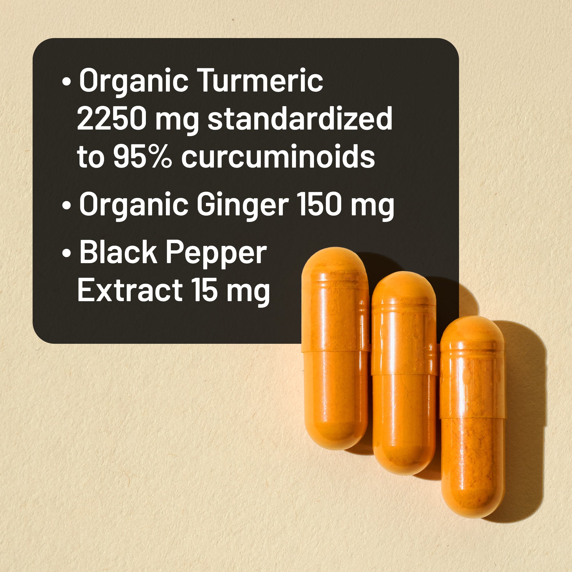Three orange capsules with text detailing their ingredients on a beige background