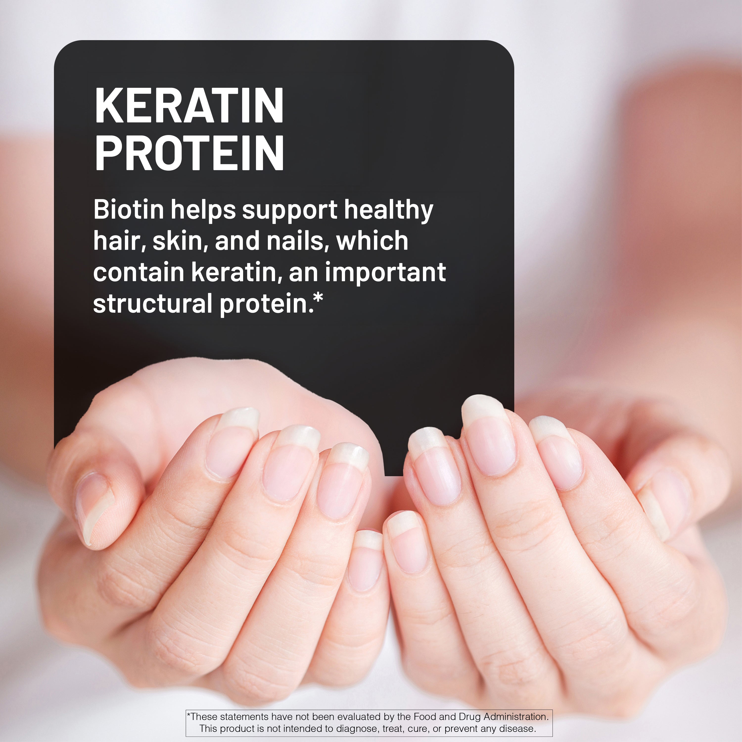 Text overlay about keratin protein from Biotin with a pair of hand and their nails in the foreground.