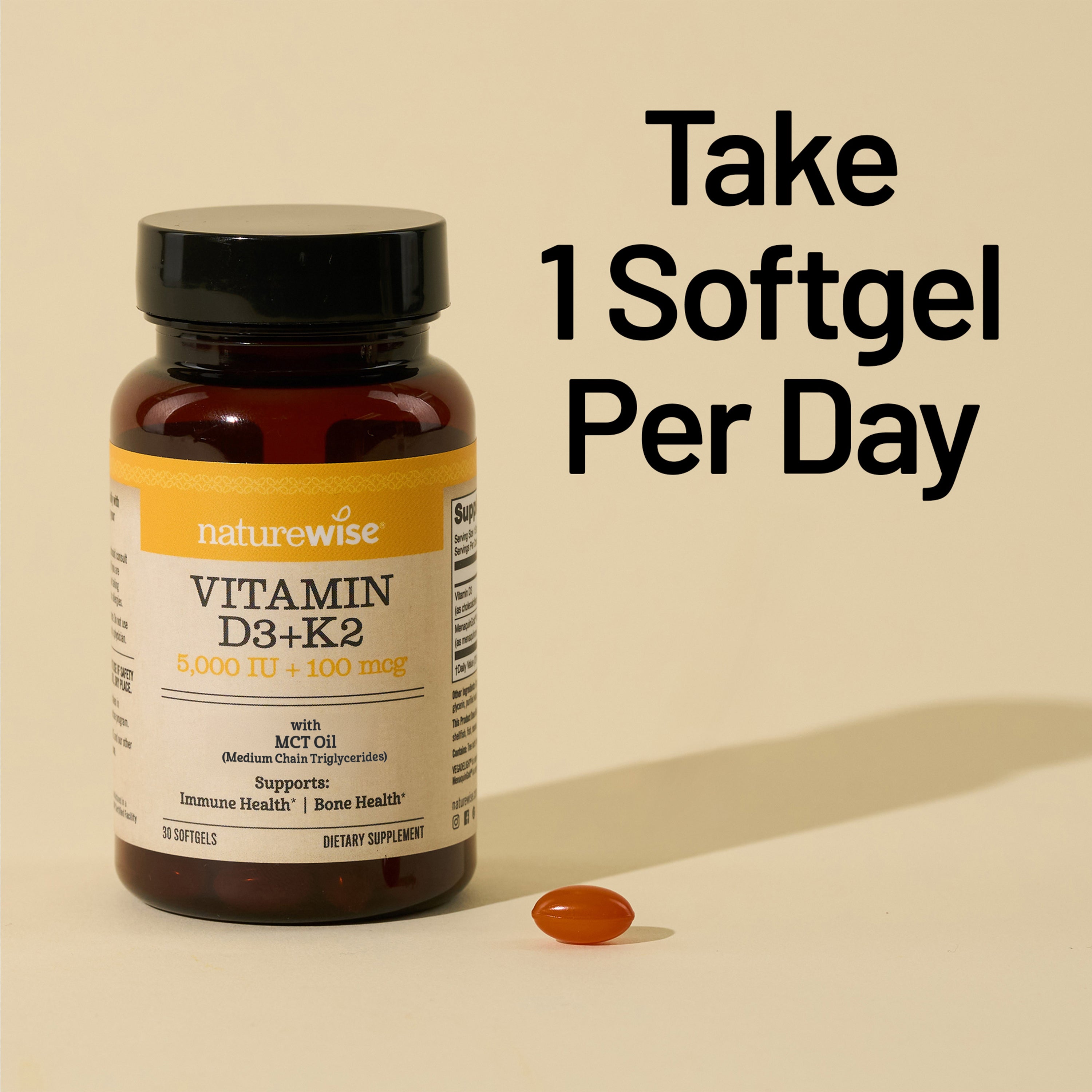 Naturewise Vitamin D3+K2 supplement bottle with a softgel on a beige background