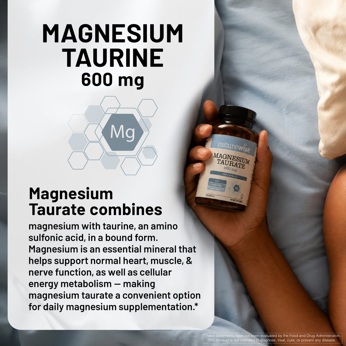 A hand holds a bottle of Magnesium Taurate 600 mg supplements next to a large informational card explaining the benefits of magnesium taurate, set against a soft blue blanket background.