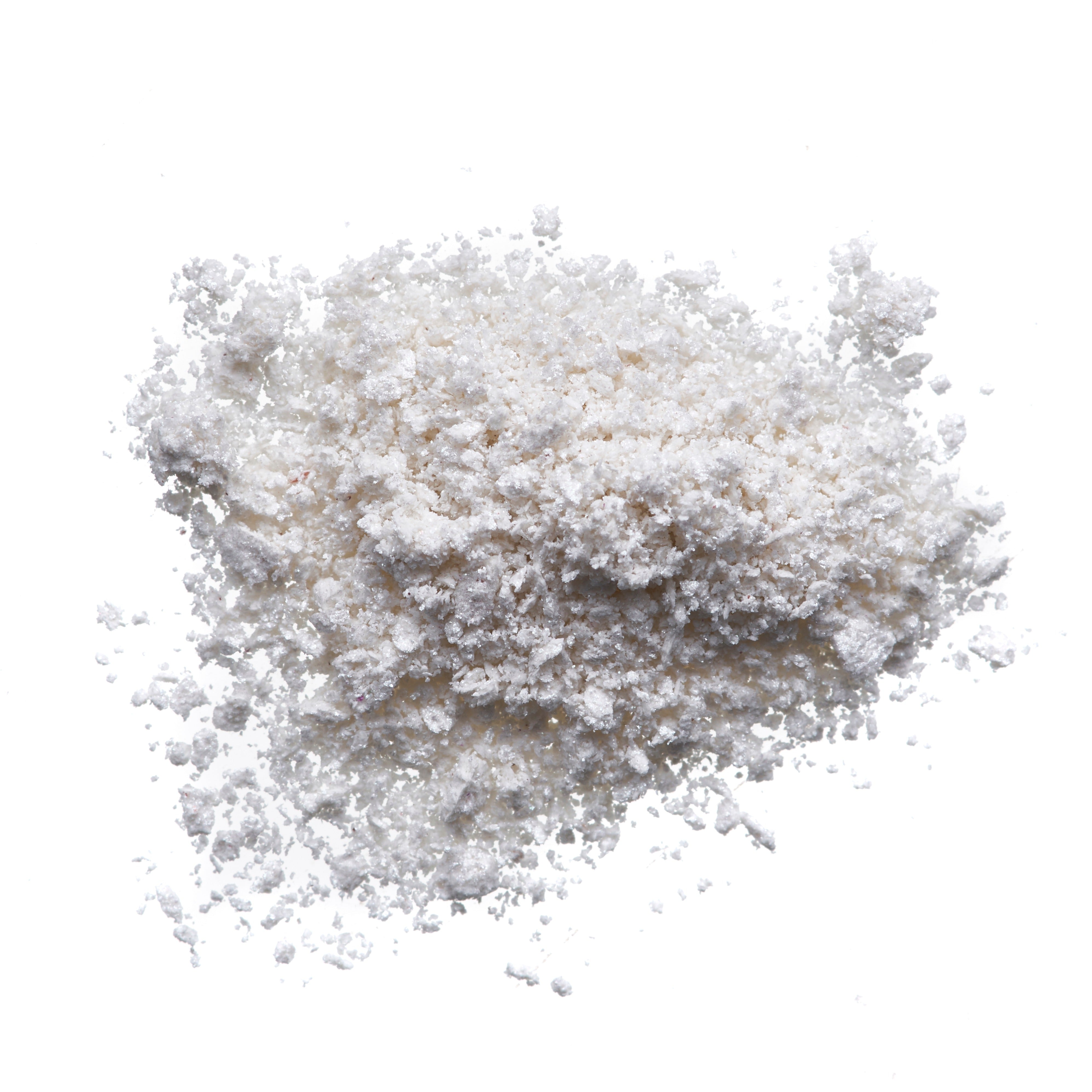 White Magnesium Taurinate powder on a white background