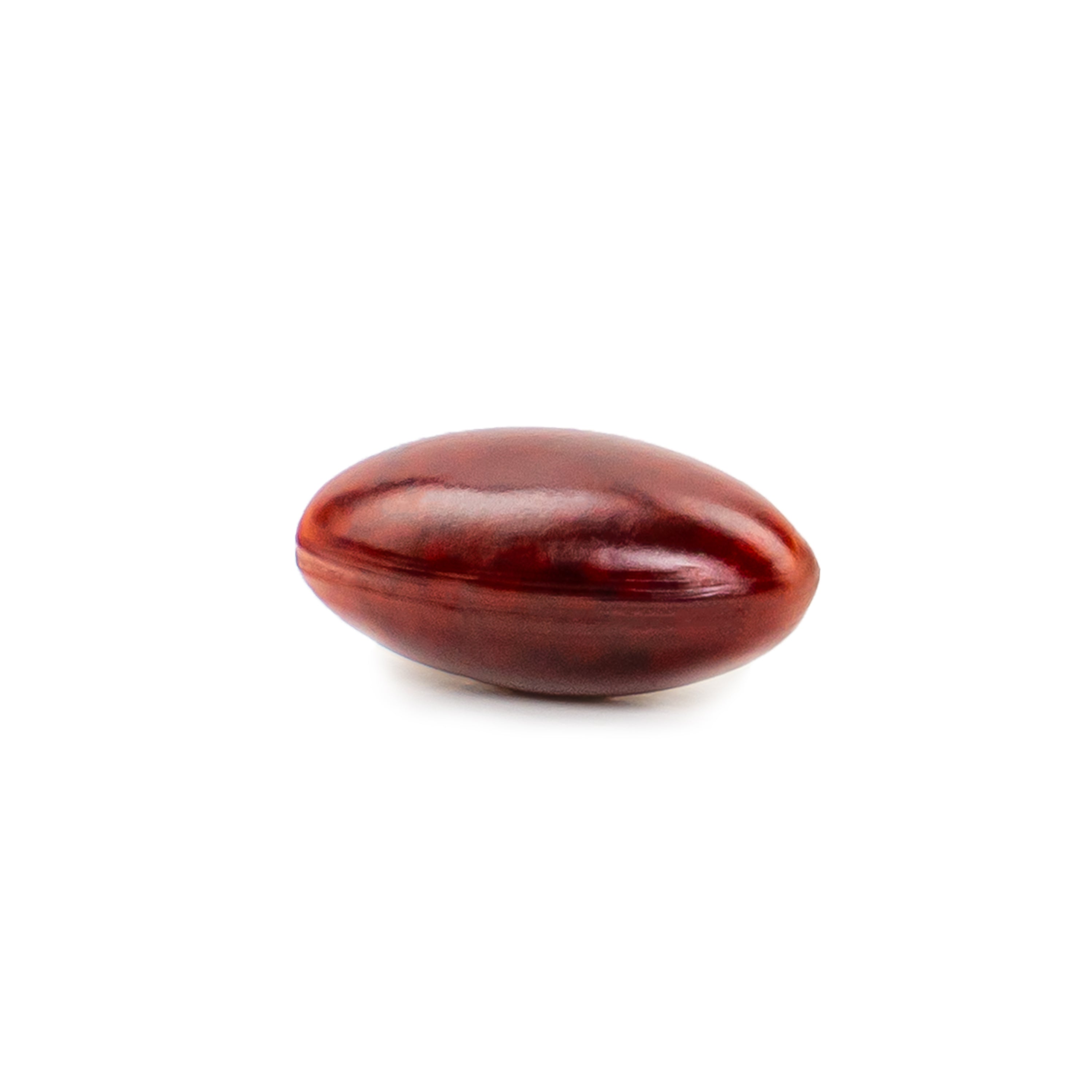 Single red vegan astaxanthin supplement softgel on a white background