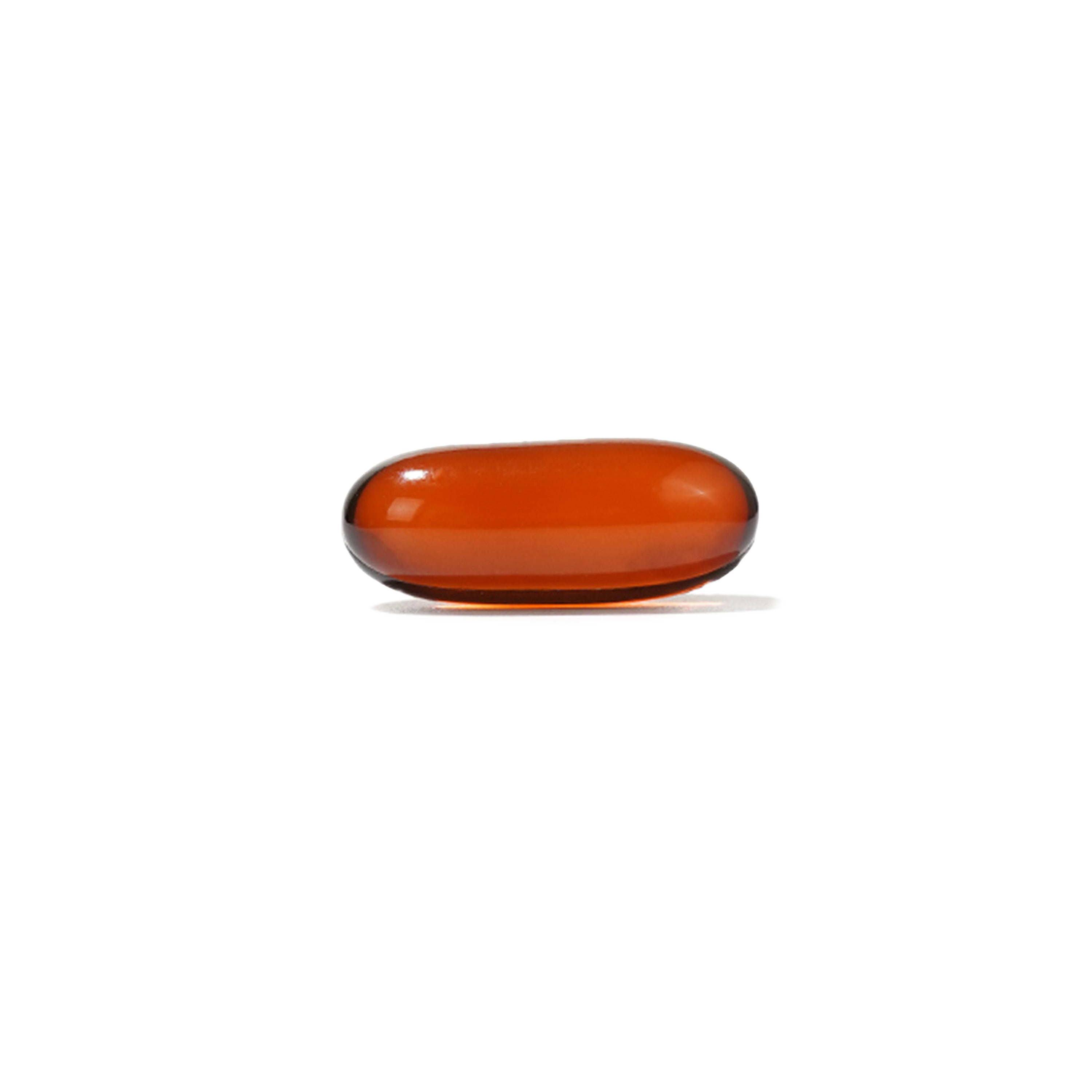 A orange CLA supplement softgel on a white background.