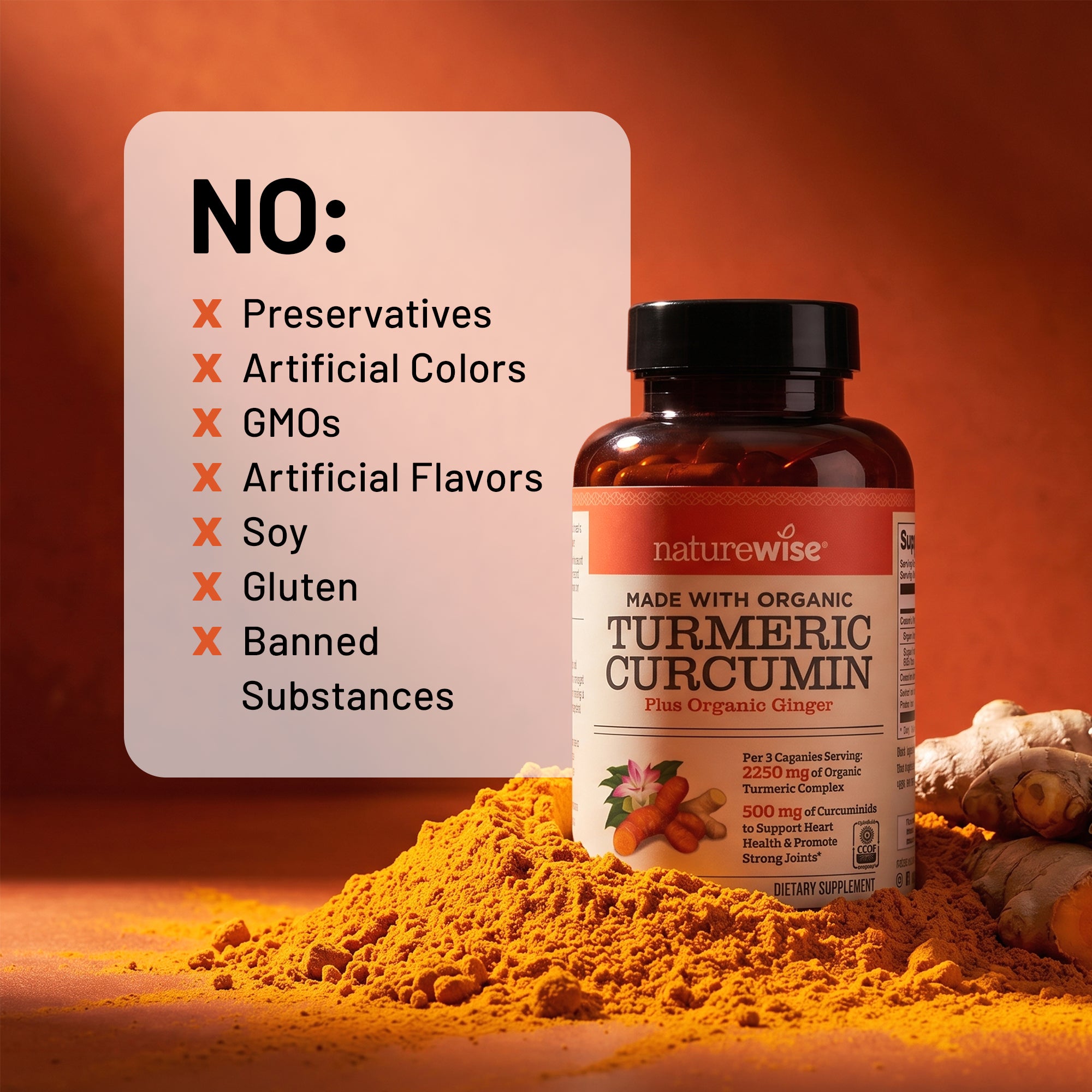 Naturewise Organic Turmeric Curcumin supplement bottle displayed with a pile of orange turmeric powder and ginger roots on a warm orange background, alongside a text panel listing excluded ingredients.