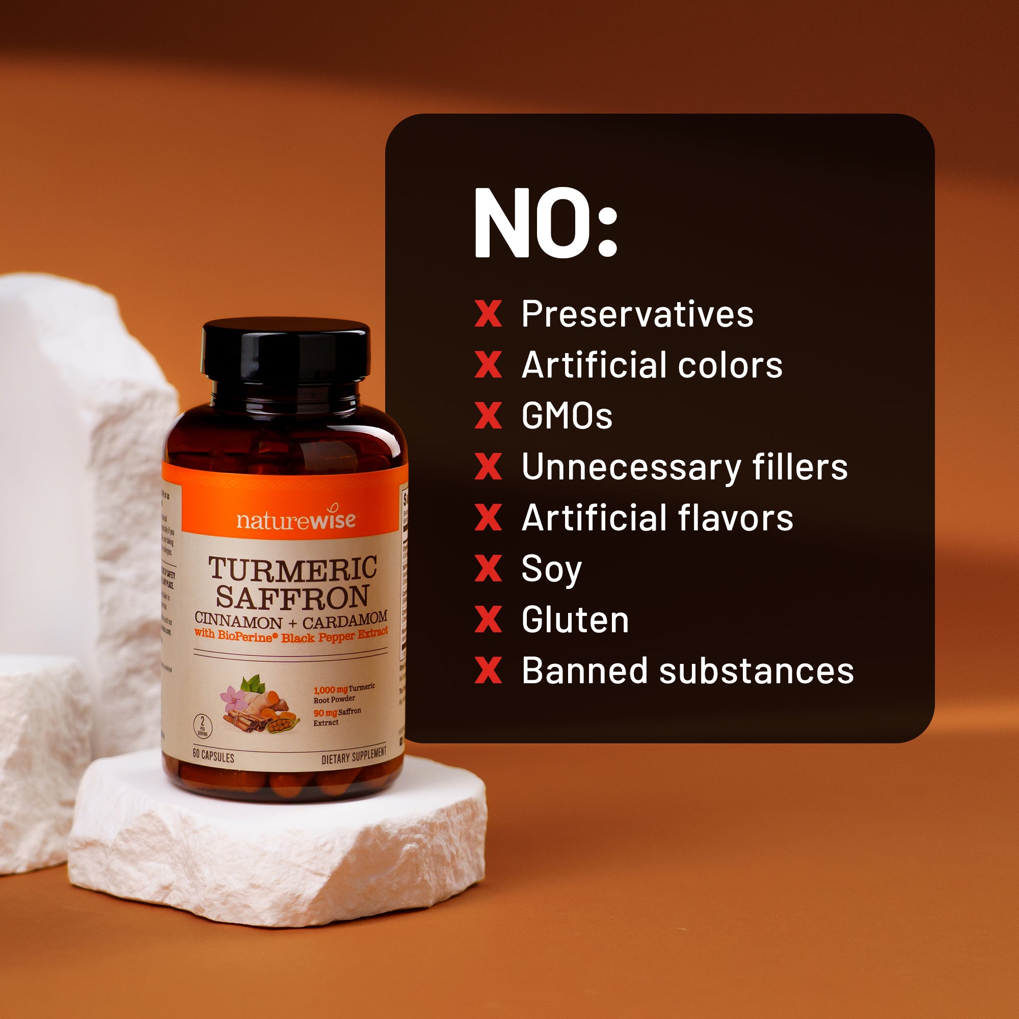 NatureWise Turmeric Saffron supplement bottle with a list of product features on an orange background