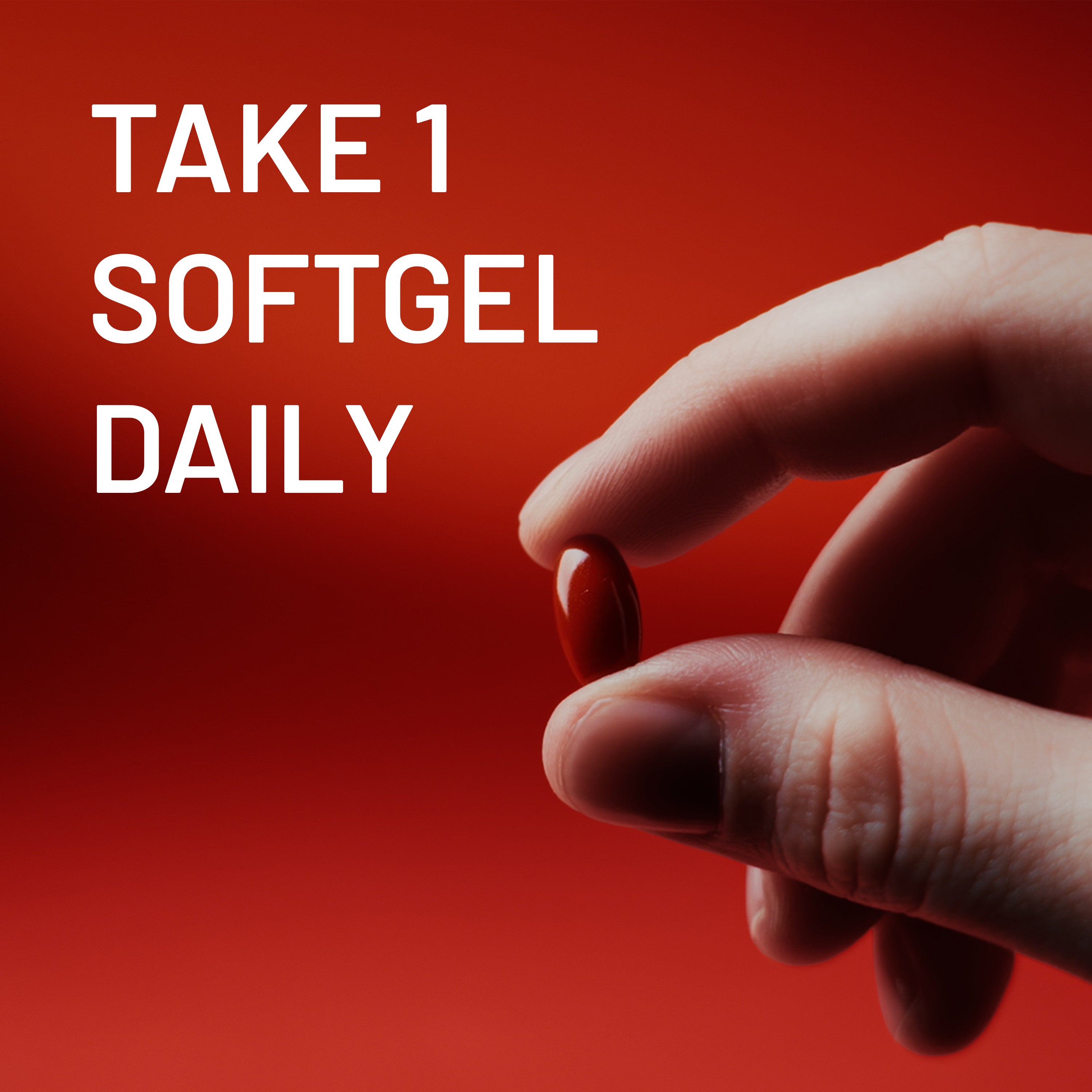 Hand holding a red softgel capsule with text 'Take 1 Softgel Daily' on a red background