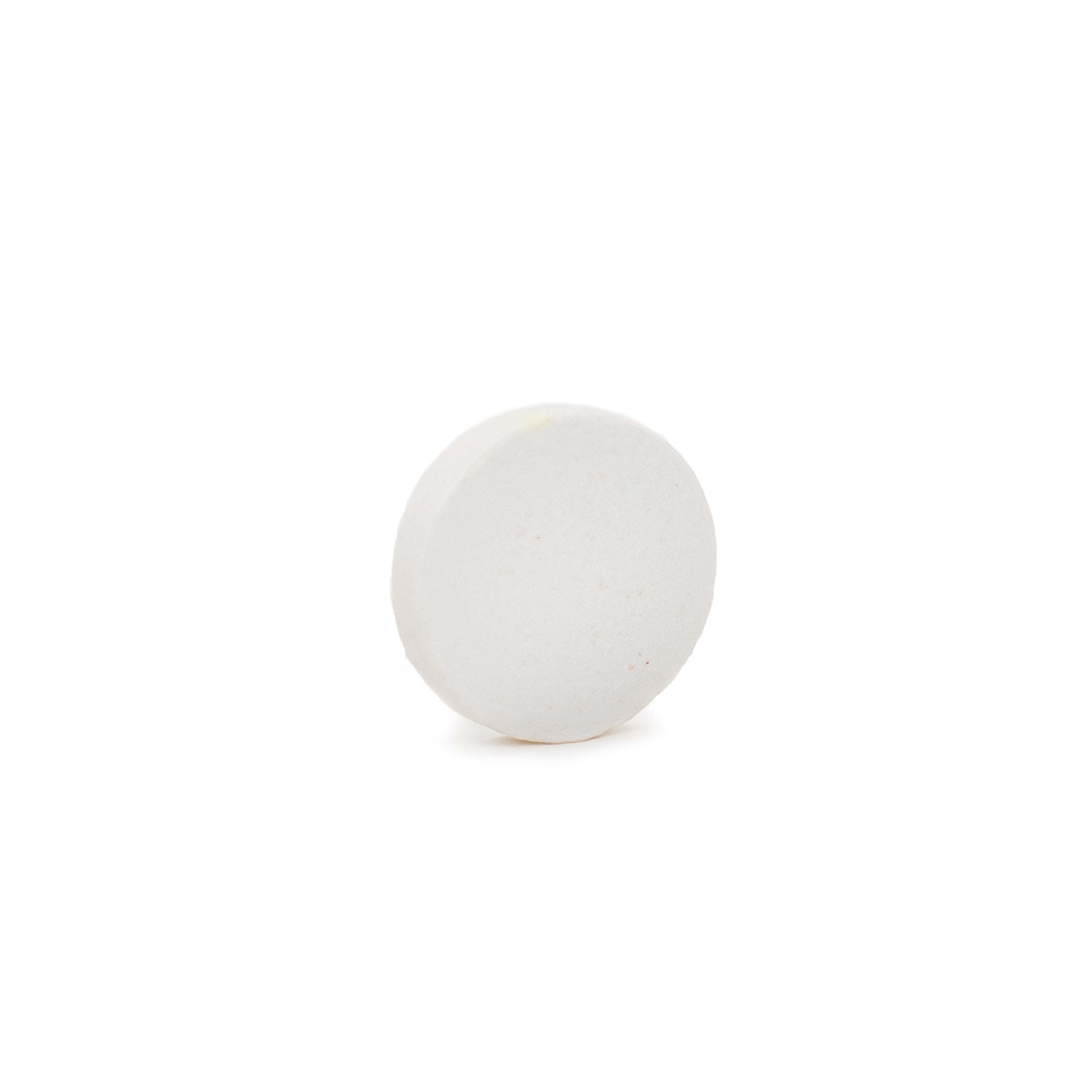 Vitamin D3 white tablet on a white background.