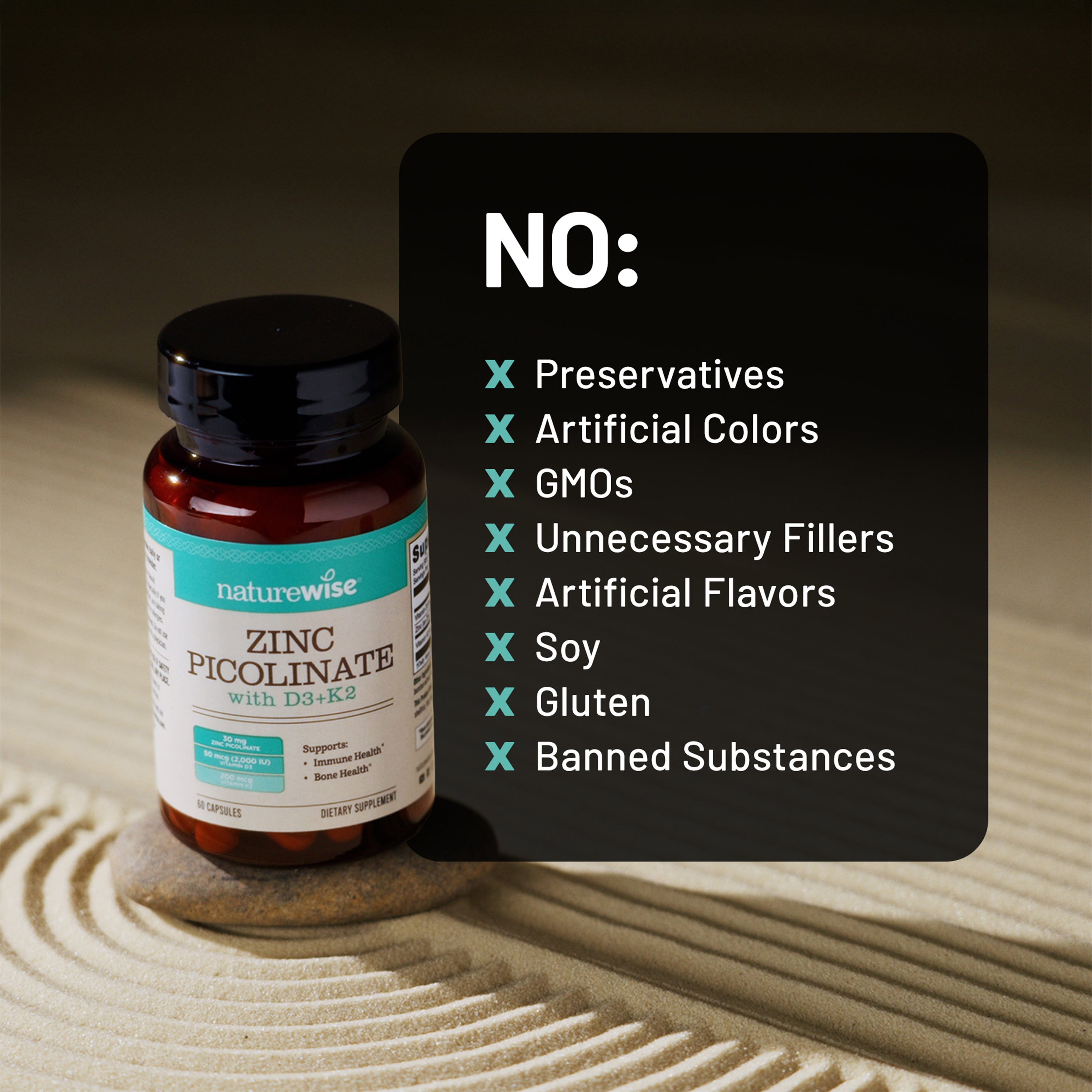Naturewise Zinc Picolinate supplement bottle with a list of no ingredients on a textured surface