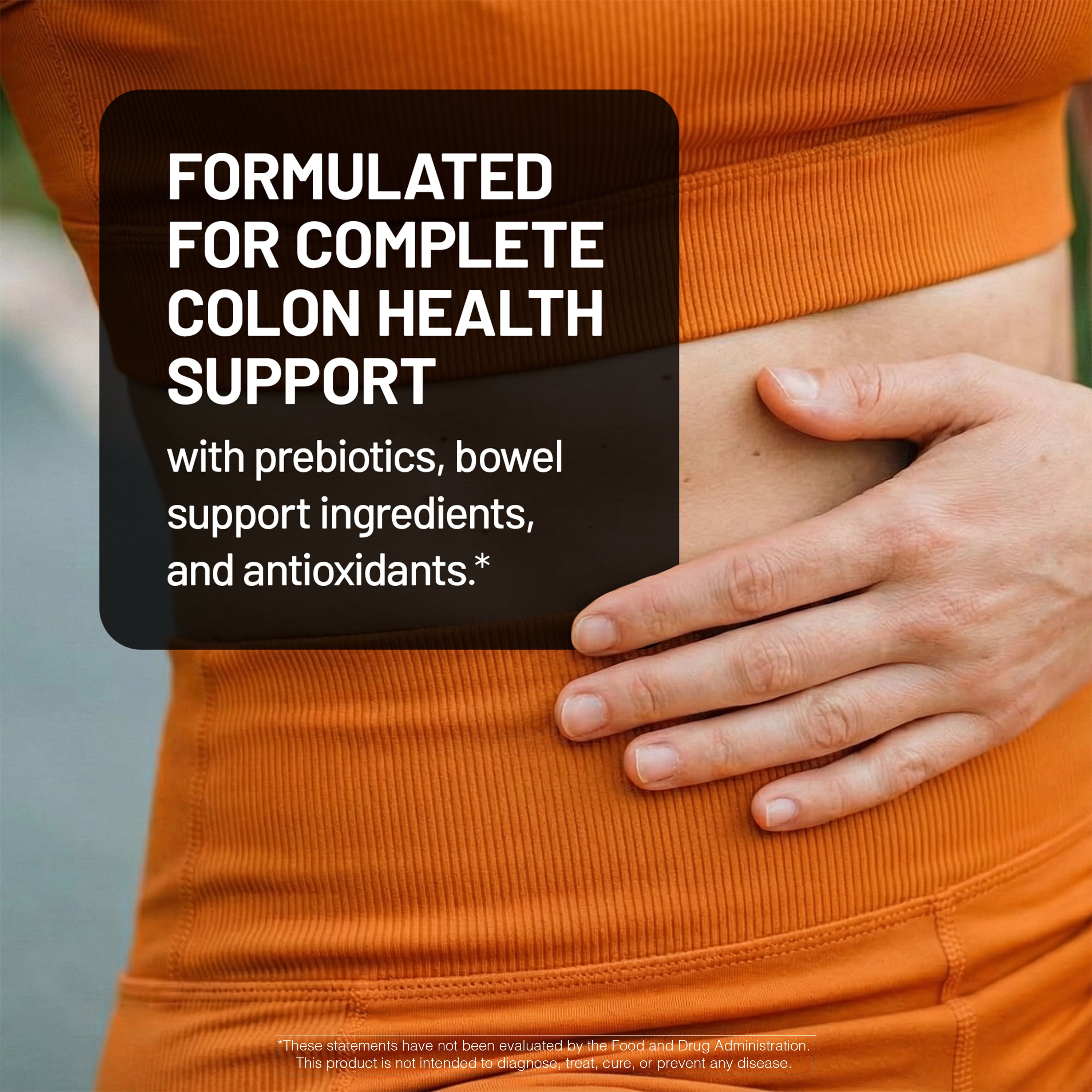 Close up of hand on woman's stomach with text about formulated for complete colon health support.