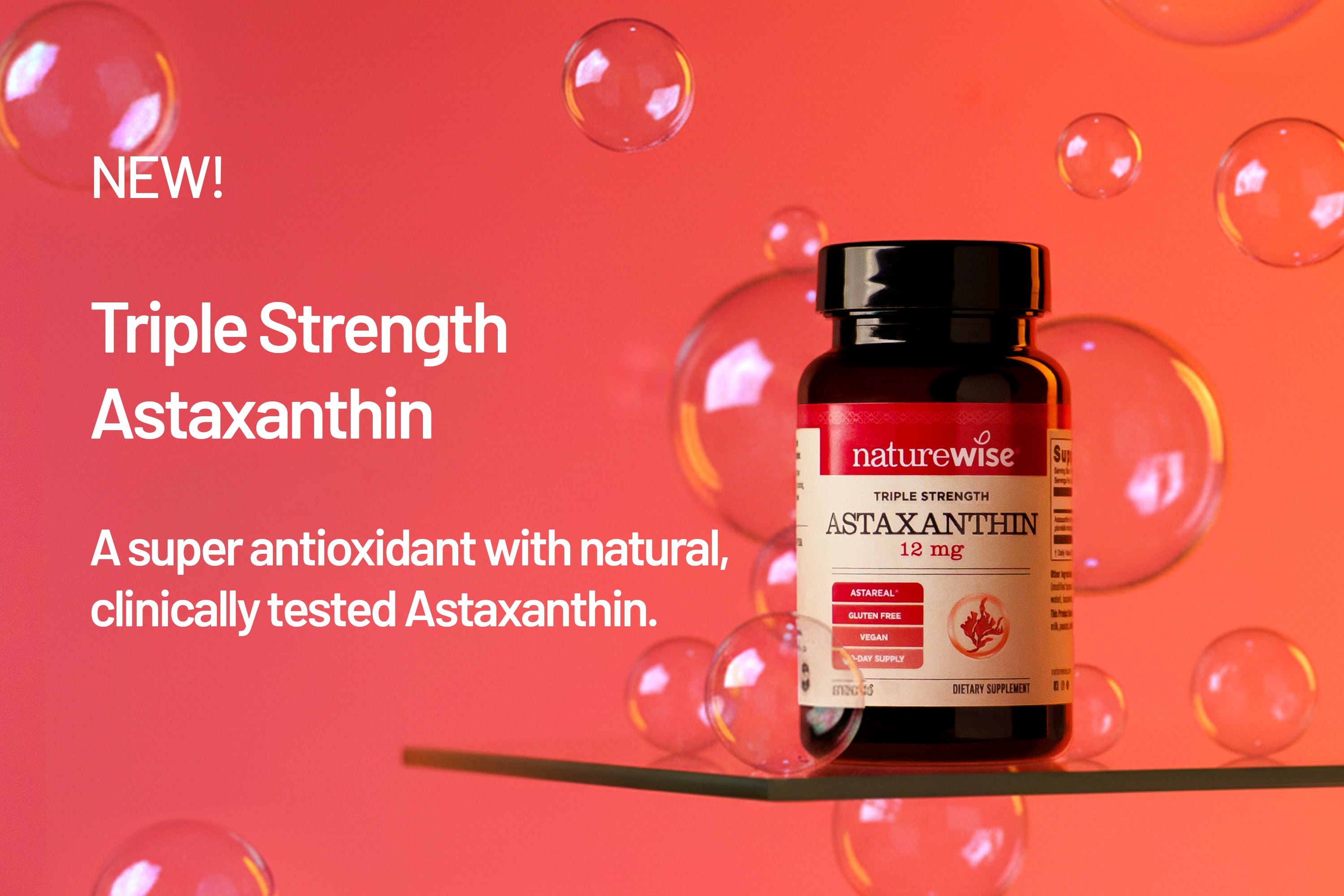 NatureWise triple strength astaxanthin supplement bottle on a red background with bubbles.
