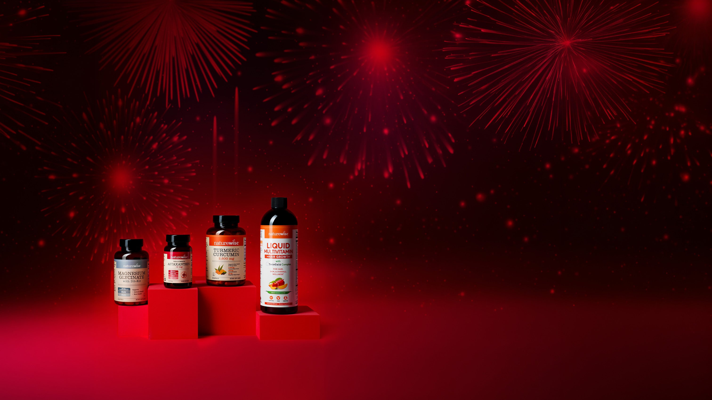 4 NatureWise supplements on a red platform with fireworks in the background