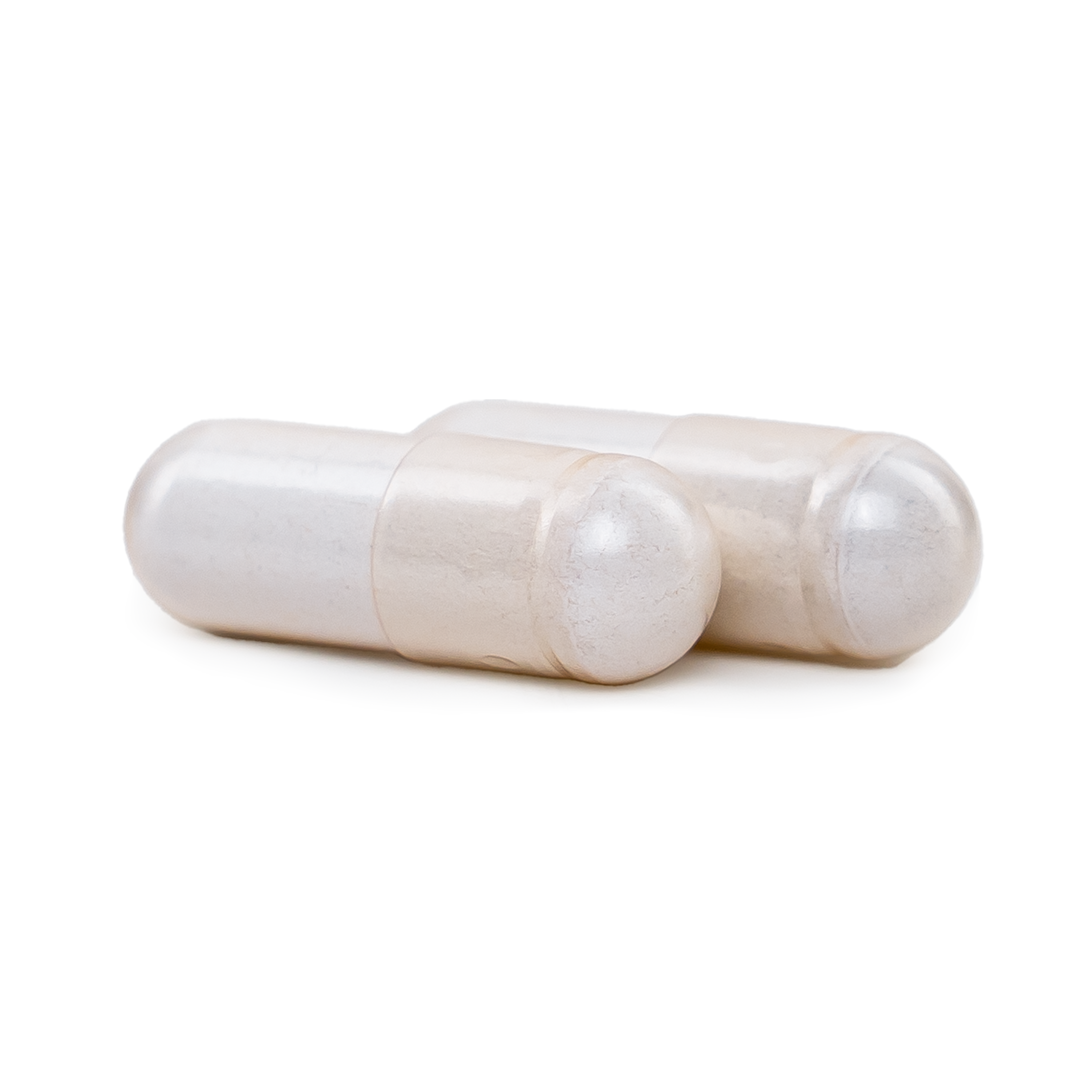 Two white NatureWise Magnesium Complex with 7 active magnesium types capsules on a blank background