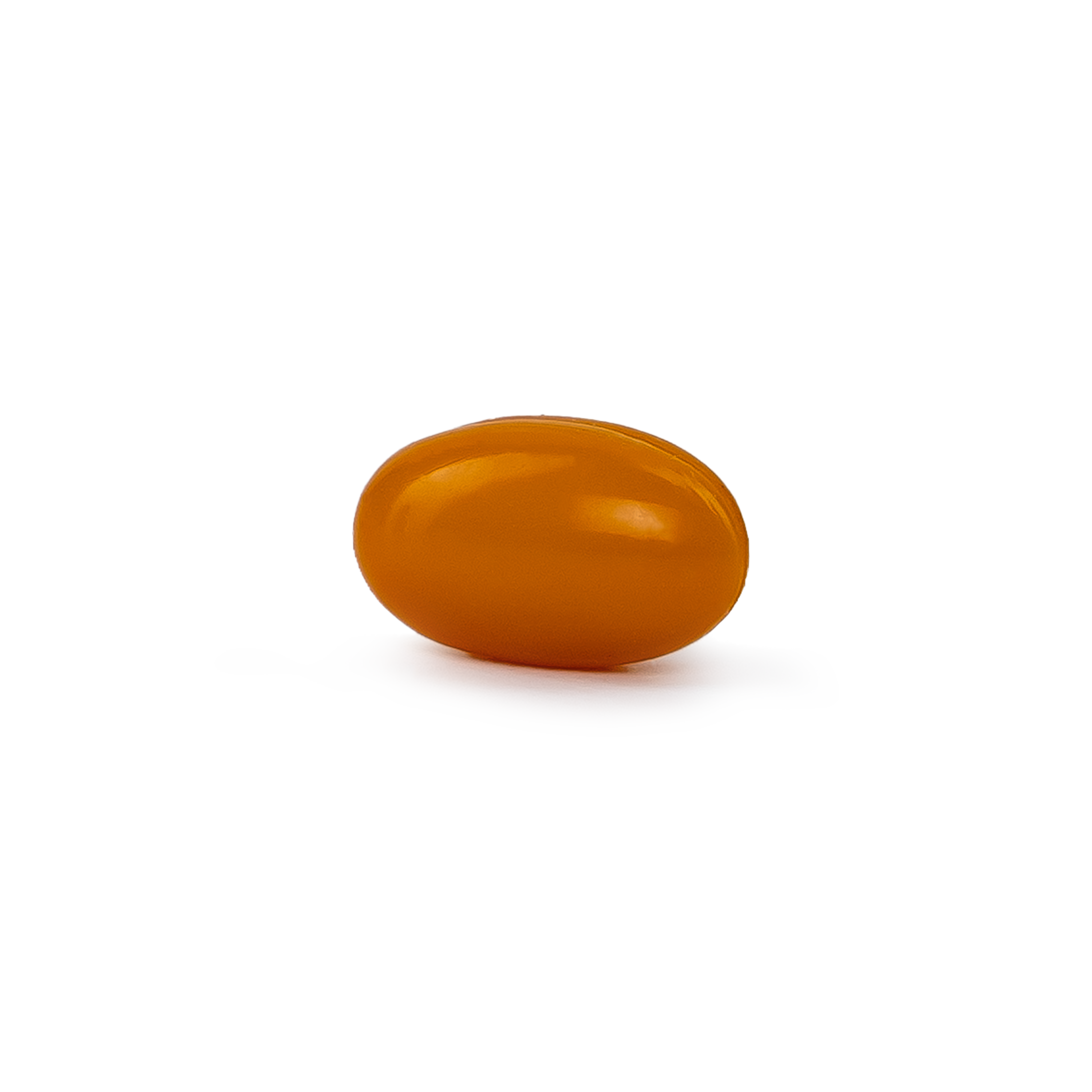 Super K supplement orange softgel on a plain background