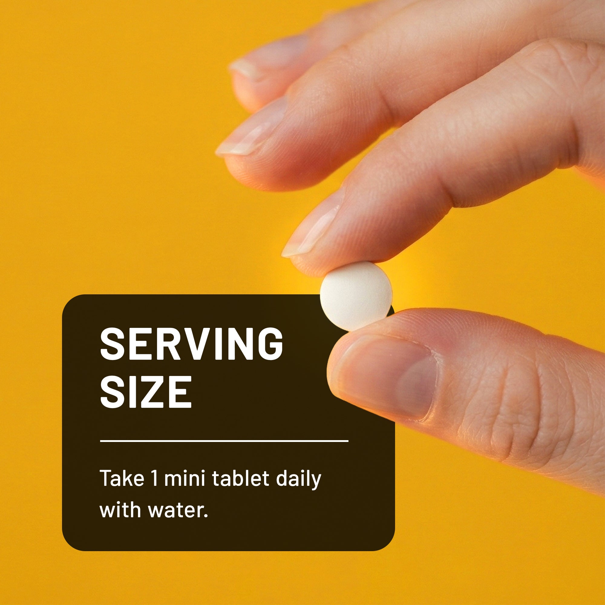 Hand holding a white NatureWise Vitamin D3 2000IU tablet supplement with text on a yellow background